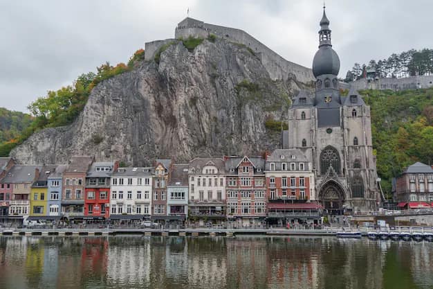 The town of Dinant on the Meuse river below its citadel and collegiate church in Belgium