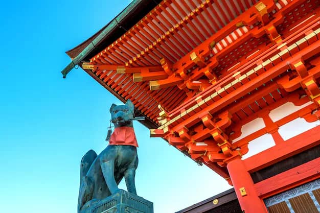 Rows of vermilion torii gates at Fushimi Inari shrine in Kyoto, Japan