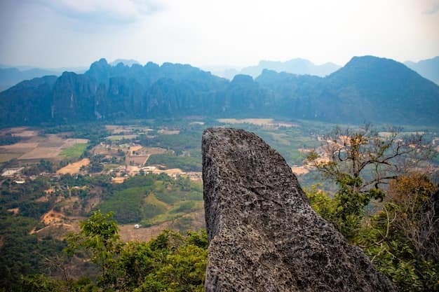 Limestone karst peaks rising above the Nam Song valley, seen from the Nam Xay viewpoint at Vang Vieng in Laos