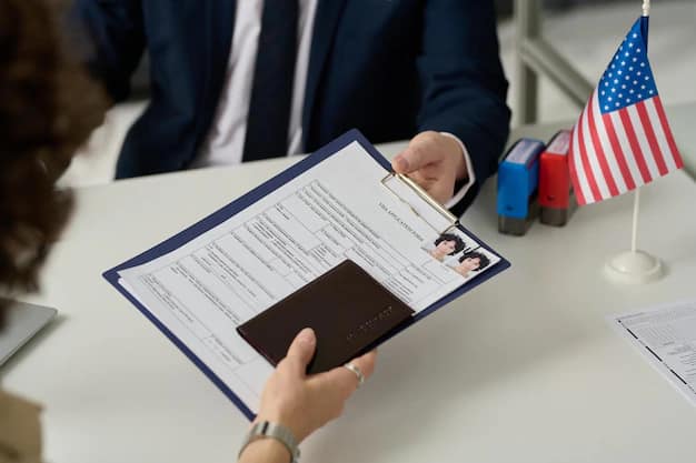 An applicant handing a US visa application form across a counter