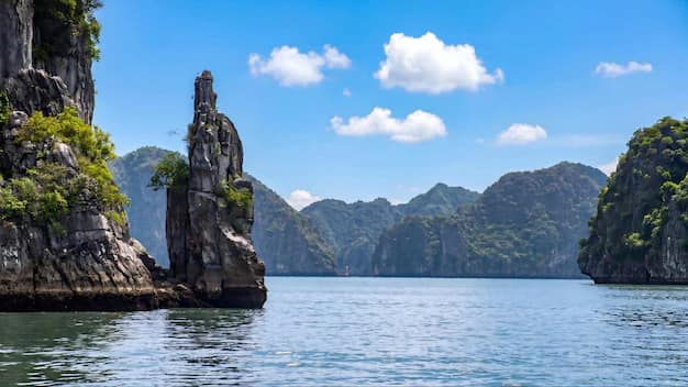 Limestone karsts rising from the water in Ha Long Bay, Vietnam