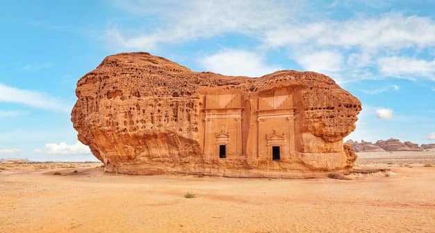 Nabataean tomb facades carved into the rock at Jabal Al Ahmar, Hegra, near AlUla in Saudi Arabia